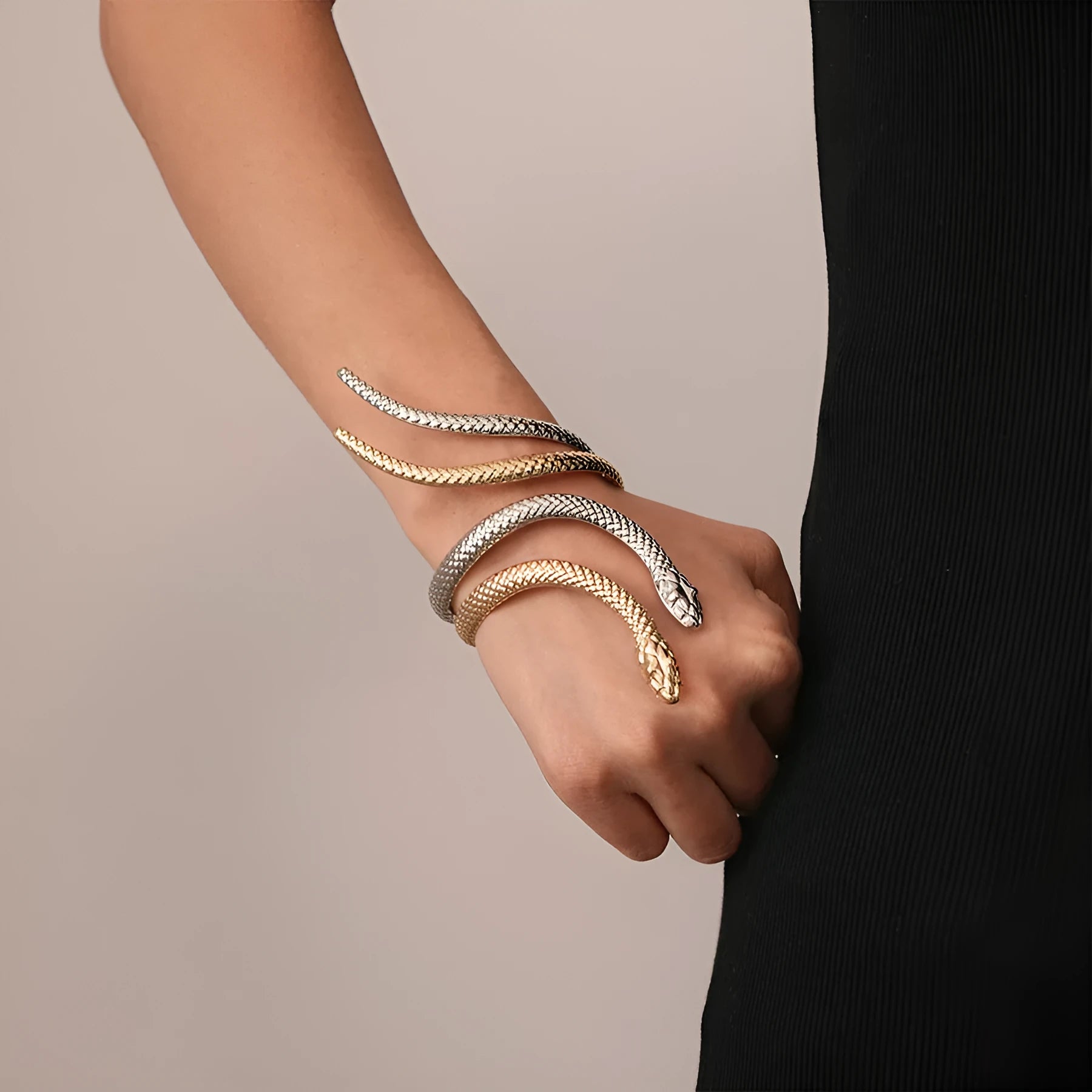 Gold tone simulated snake jewellery set with twisted winding ring and bracelet