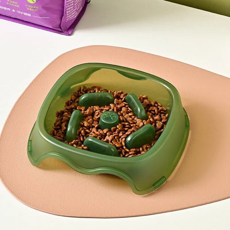 Blue plastic slow feeder dog bowl with raised obstacles for anti-choking design