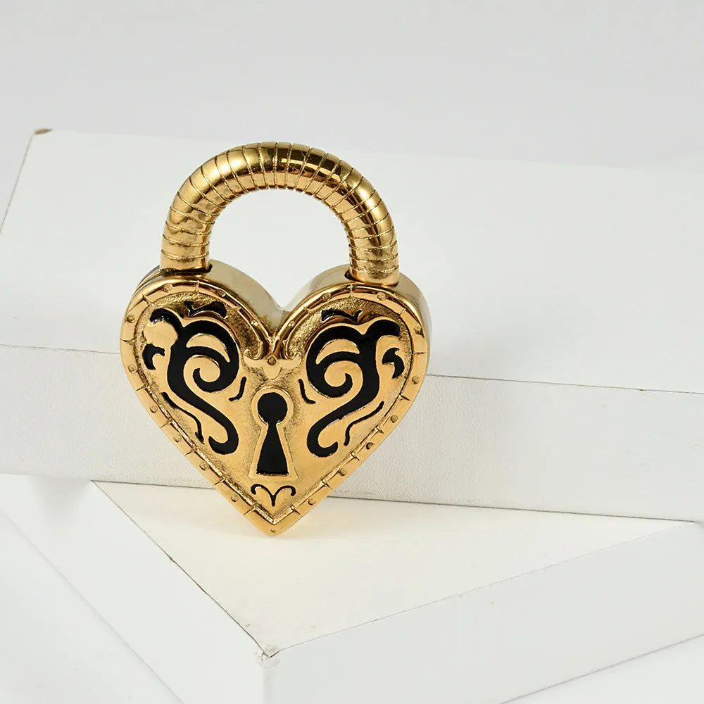 Single stainless steel heart-shaped stud earring for fresh piercings in gold colour.