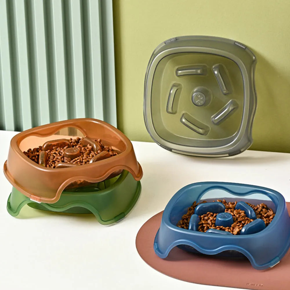 Blue plastic slow feeder dog bowl with raised obstacles for anti-choking design