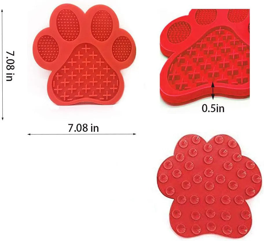 Blue silicone dog licking mat with bone texture and suction cups on a white tile background.