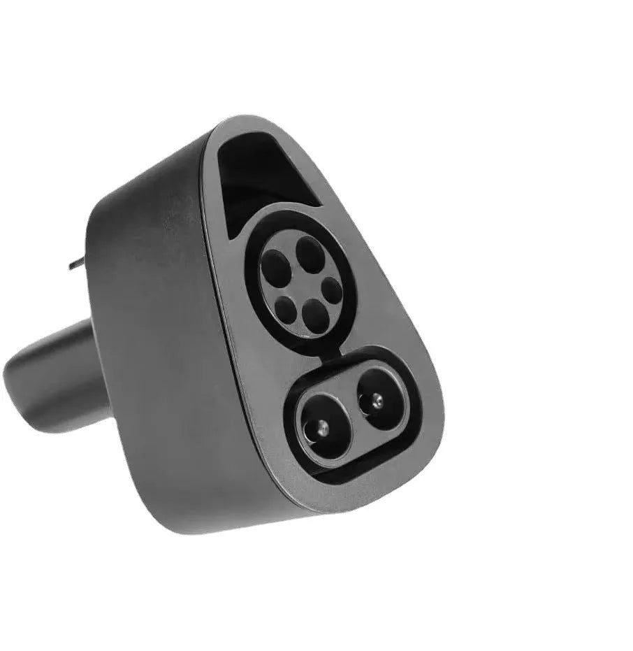 Black Tesla charging plug conversion adaptor for American Standard to UK socket conversion