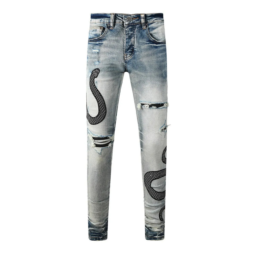 Blue distressed wash skinny jeans with mid waist and skinny leg silhouette