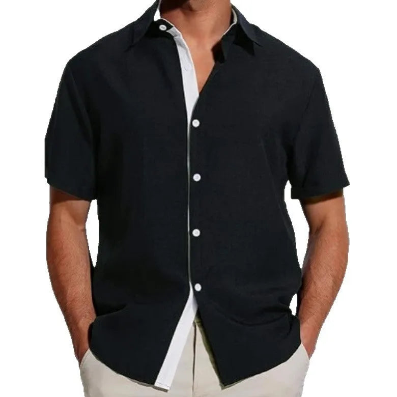 Men's grey floral print short-sleeved casual shirt laid flat, showing regular fit and lightweight polyester fabric.
