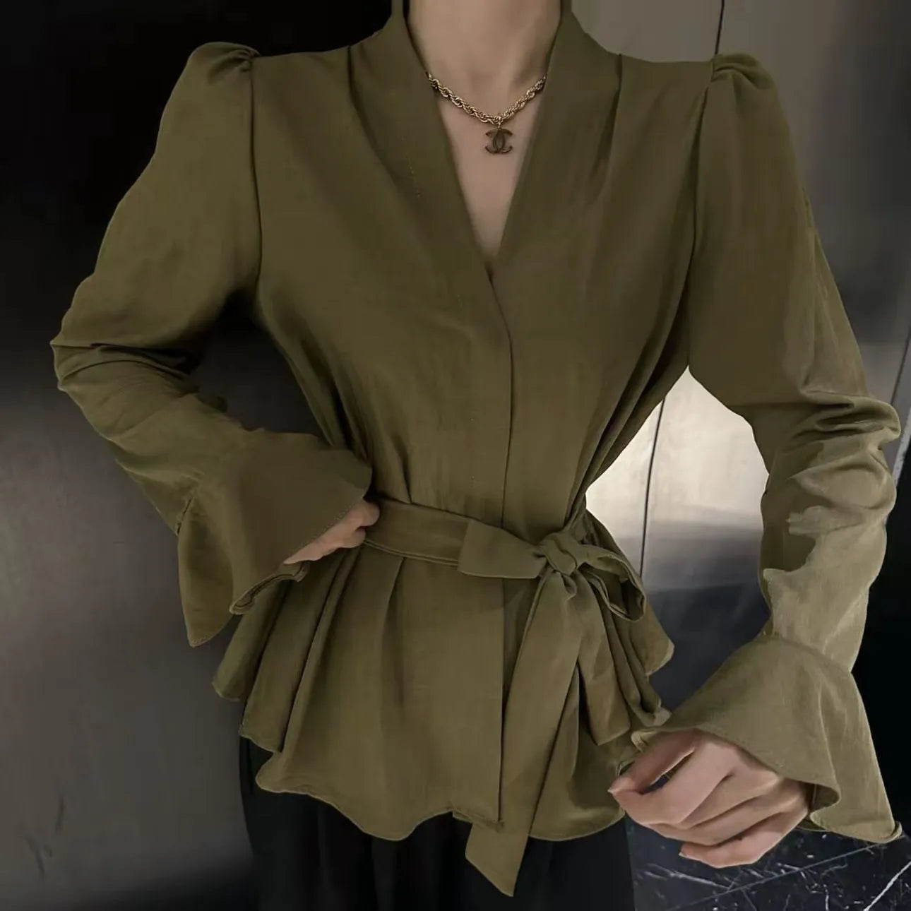 Women's French-style shirt with irregular collar, bell sleeves, and tied front in polyester fabric