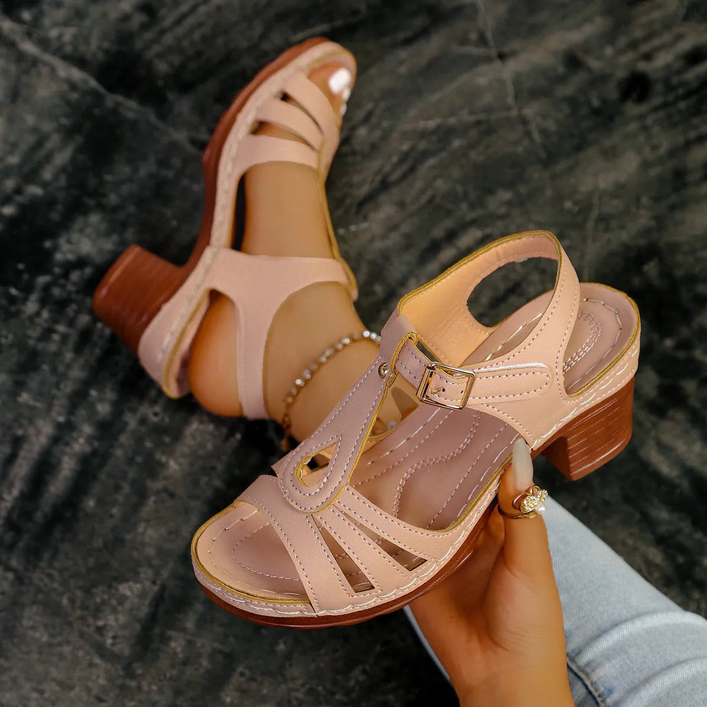Women's black peep toe wedge platform sandals with a silver buckle closure on the instep.