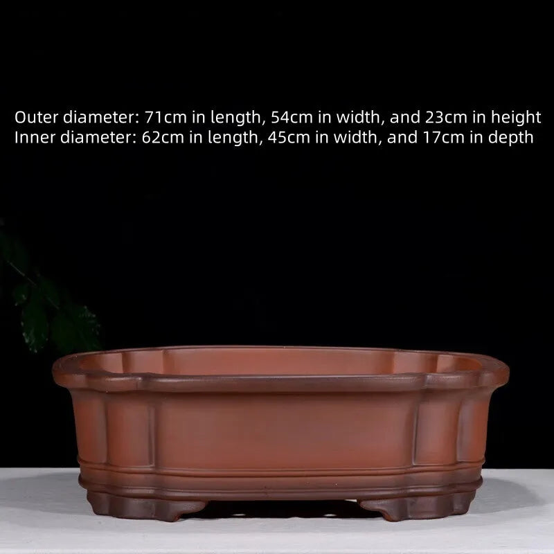 Chinese-style antique finish purple clay oval flowerpot measuring 71cm long by 54cm wide