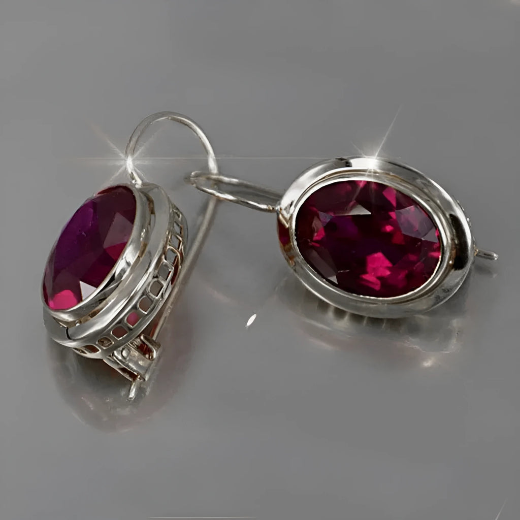 Red oval gemstone hollow earrings in electroplated alloy, geometric women's design, silver gold or rose gold finish
