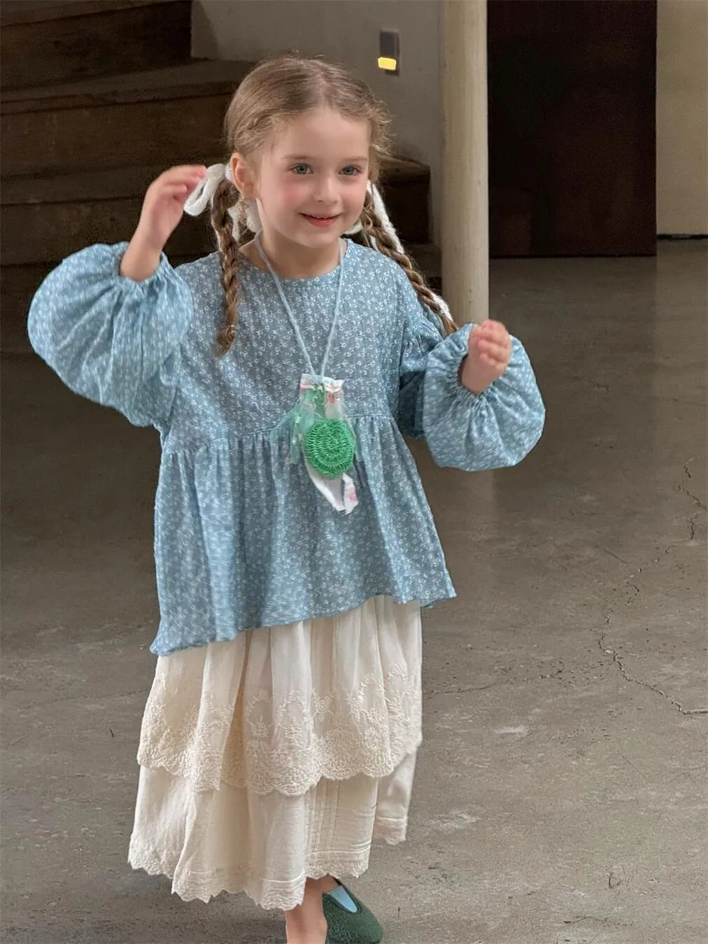 Blue cotton round neck doll shirt with floral pattern for girls long sleeves