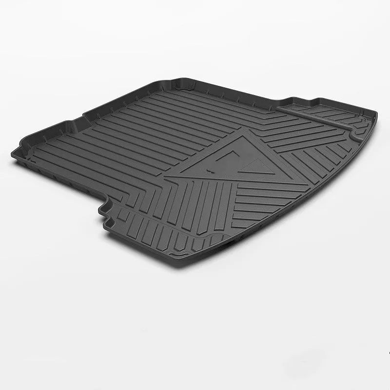 Black TPE car boot protection pad with carbon fibre pattern texture