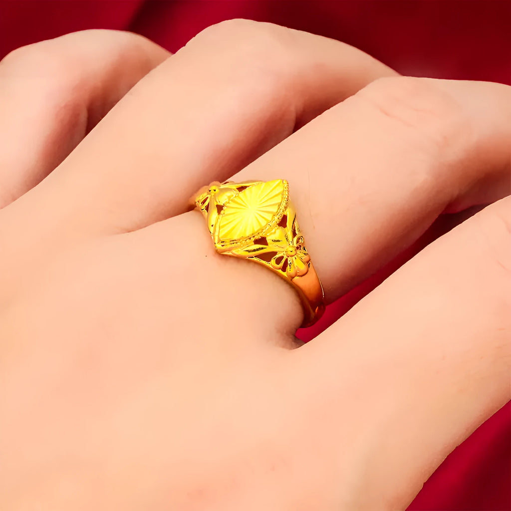 Electroplated gold brass ring with geometric open diamond floral design and textured detailing