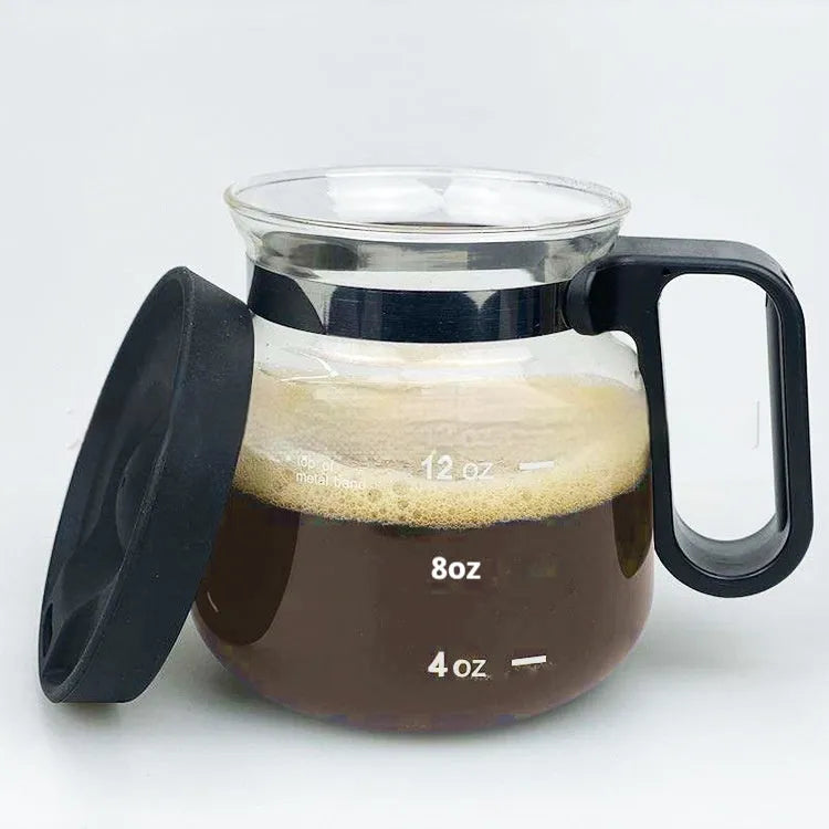 Transparent borosilicate glass coffee maker with silicone cover showing 355-473ml capacity markings