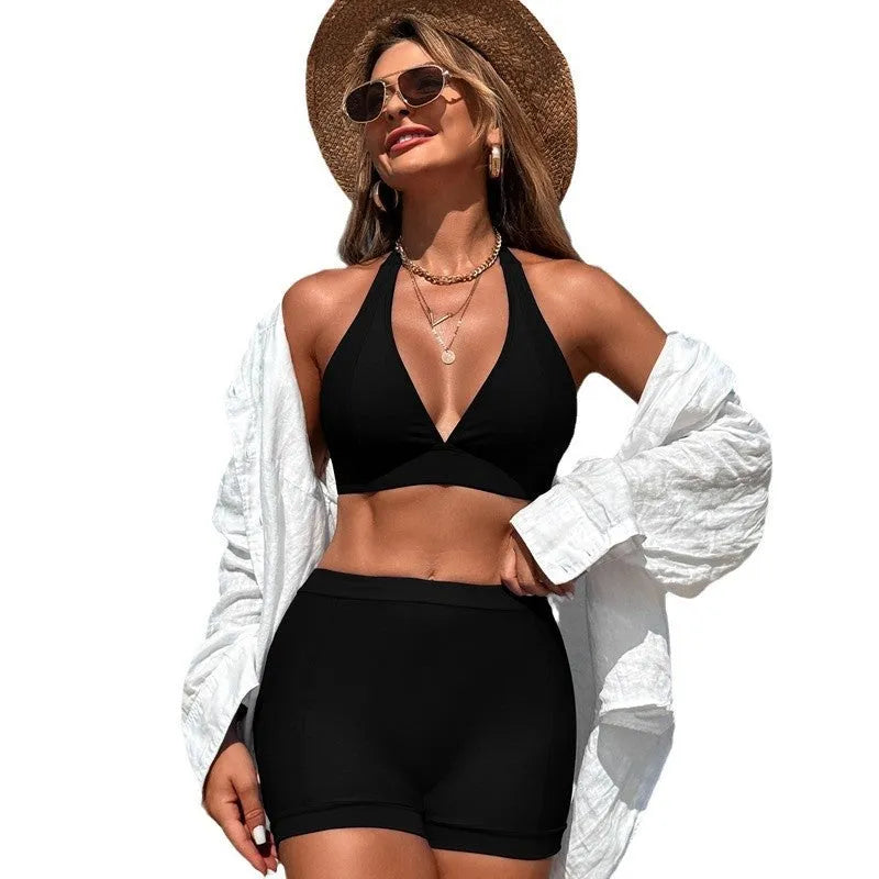 Women's sleeveless split bikini swimsuit in nylon with polyester lining available in black pink and blue