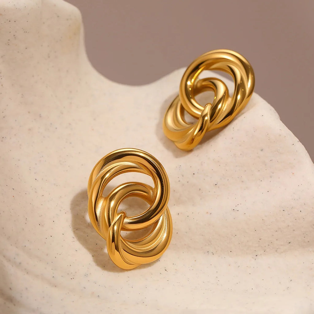 Minimalist geometric circle stud earrings in gold, stainless steel with electroplating and 18K purity