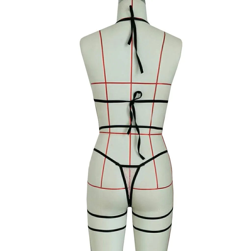 Pink lace hollow three-point lingerie set with leg straps on a model