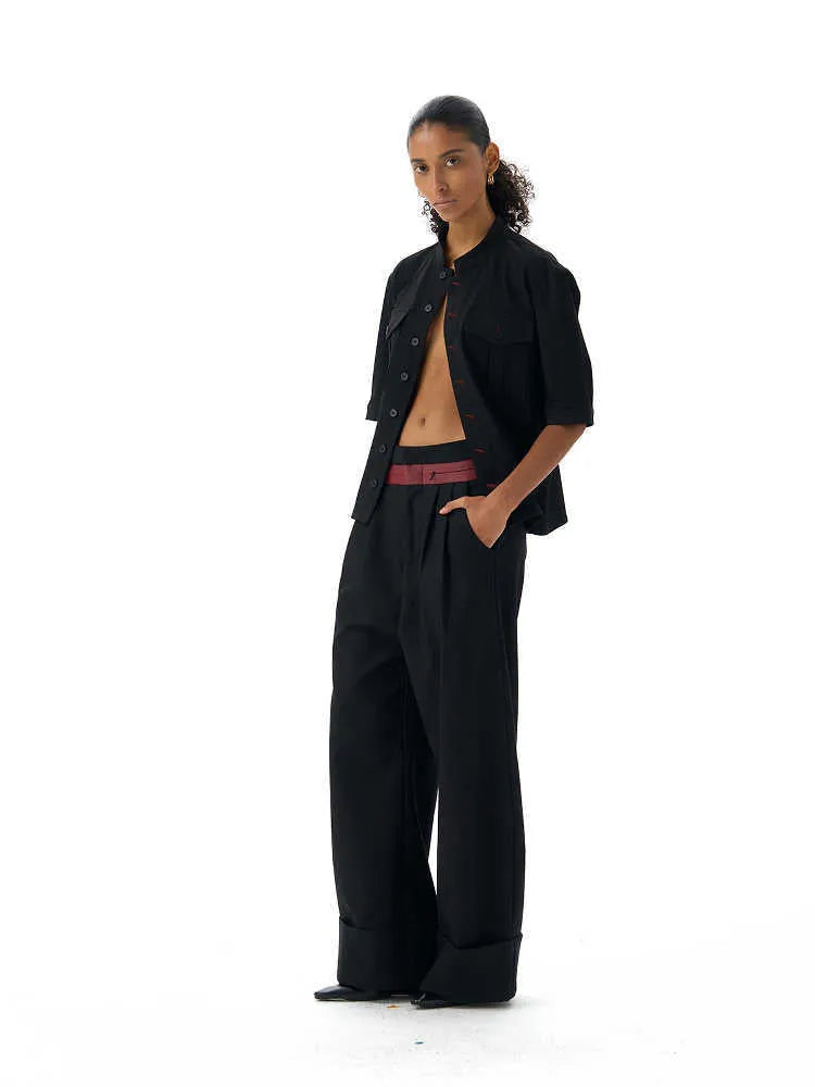 Black handmade loose fit half sleeve hunting shirt with a shirt collar.