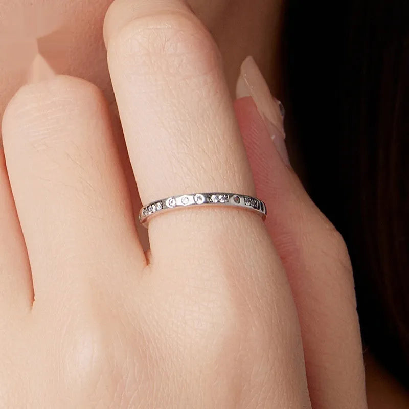 Silver oxidised black alloy 'I Love You' fashion ring for women on a plain background.