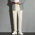 Men's straight leg suit trousers in chemical fibre blend fabric showing spring draping effect