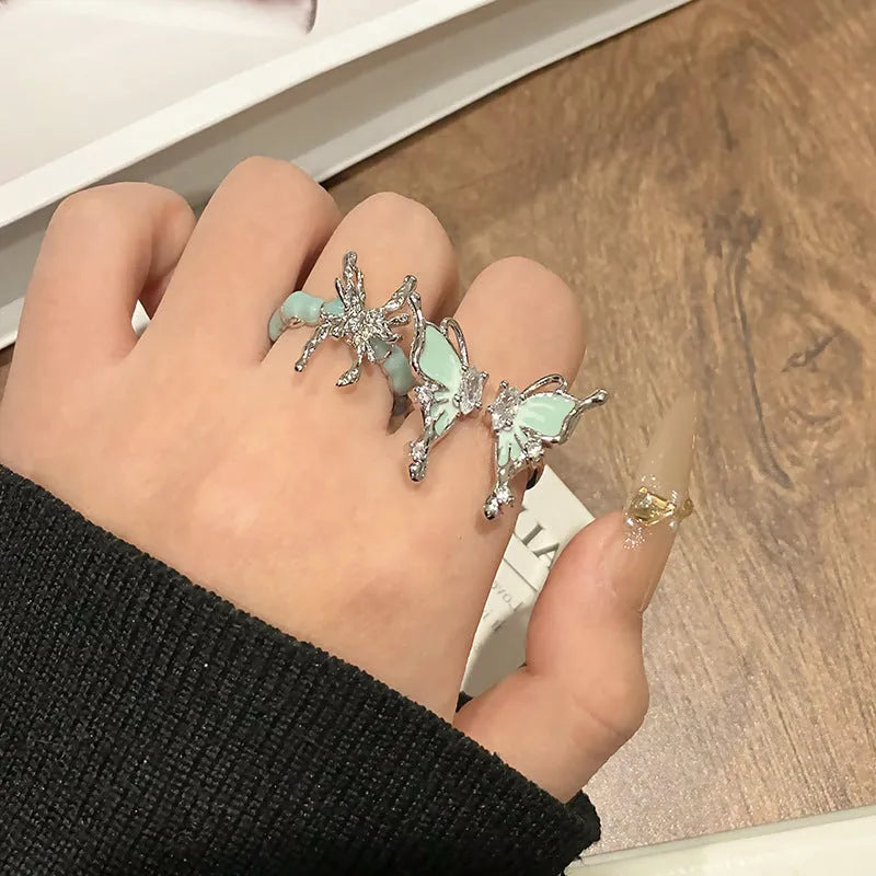 Copper women's ring featuring a creative Chinese butterfly design with an open loop, available in 33 numbered styles.