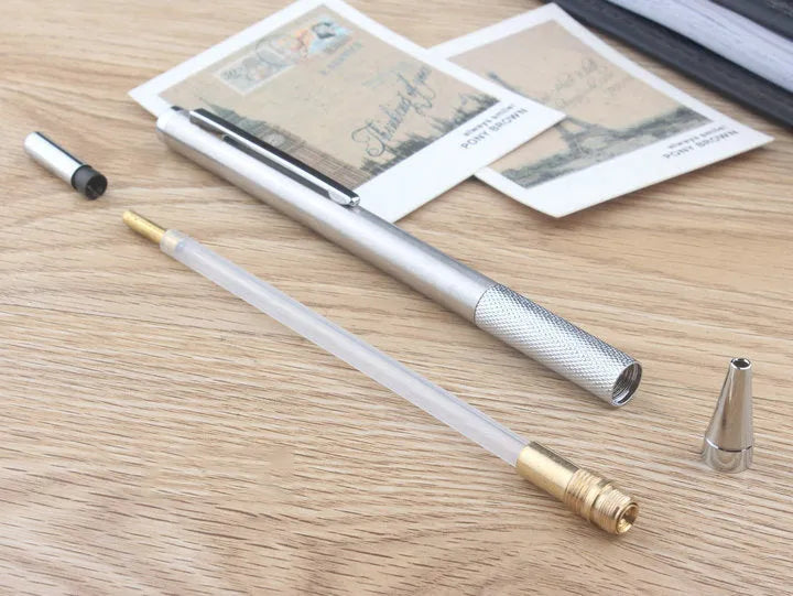 Metal automatic mechanical drafting pencil with multiple lead size options including 0.5mm and 2.0mm.