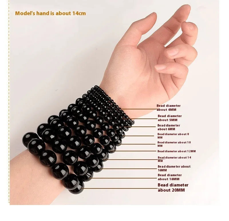 Natural smokey violet Hetian jade straight cut bracelet on a wrist.