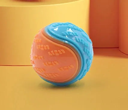 Red and blue TPR rubber dog training ball with sound, 6.5cm diameter