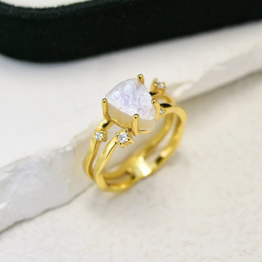 S925 sterling silver geometric ring with irregular triangle shape and moonstone detail in gold tone finish