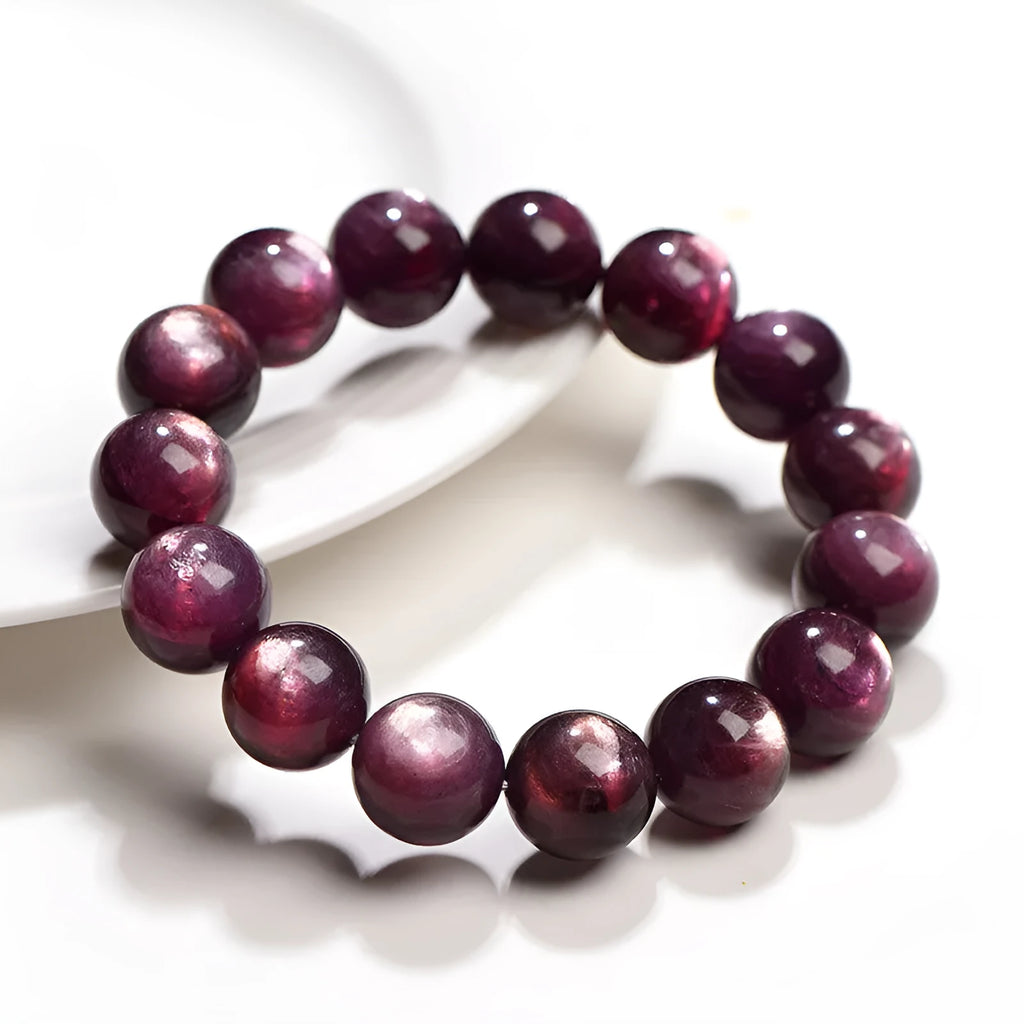 Natural purple lepidolite crystal bracelet with polished round beads in geometric design showing size options