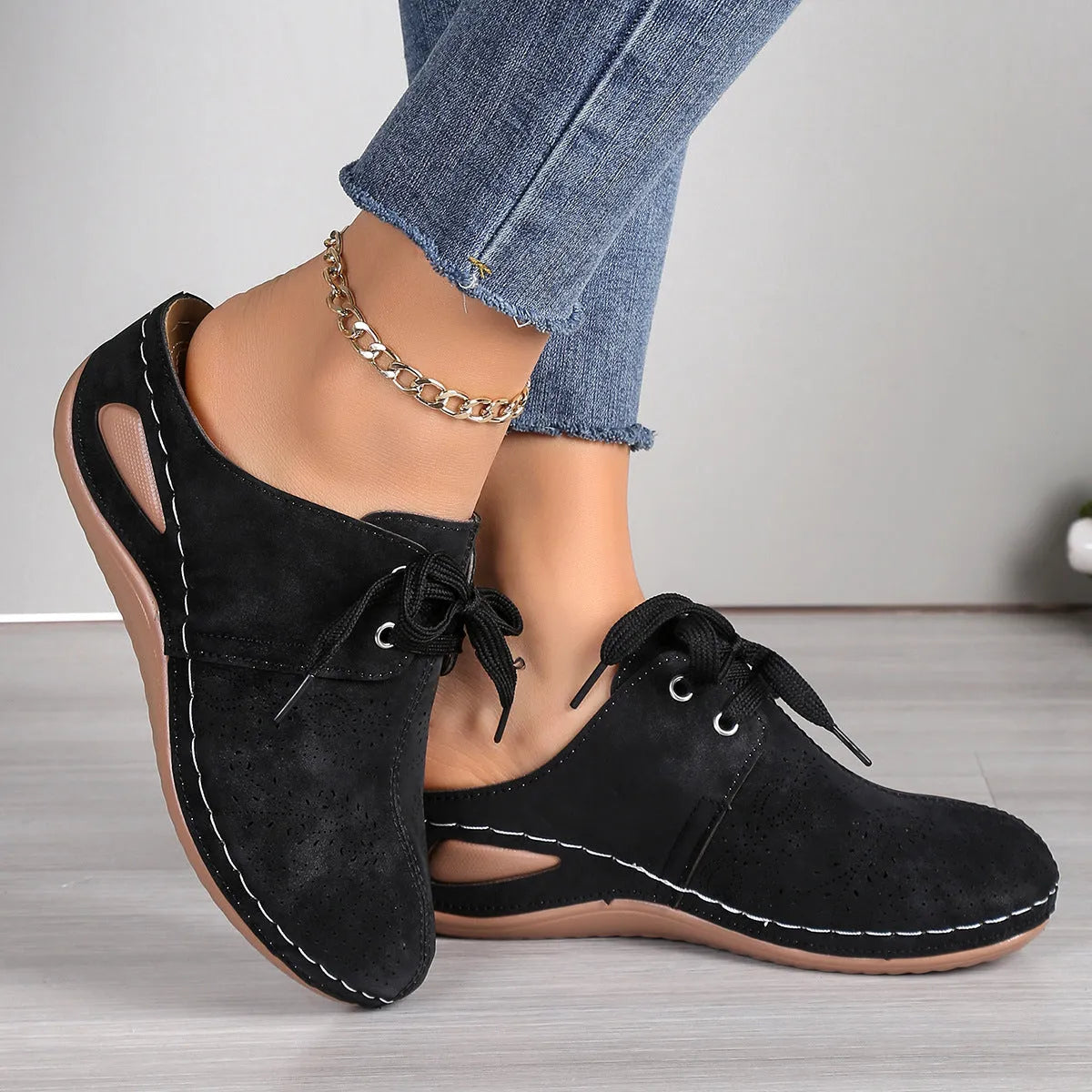 Women's lace-up summer slippers with suede upper, wedge heel, and rubber sole in various colours.