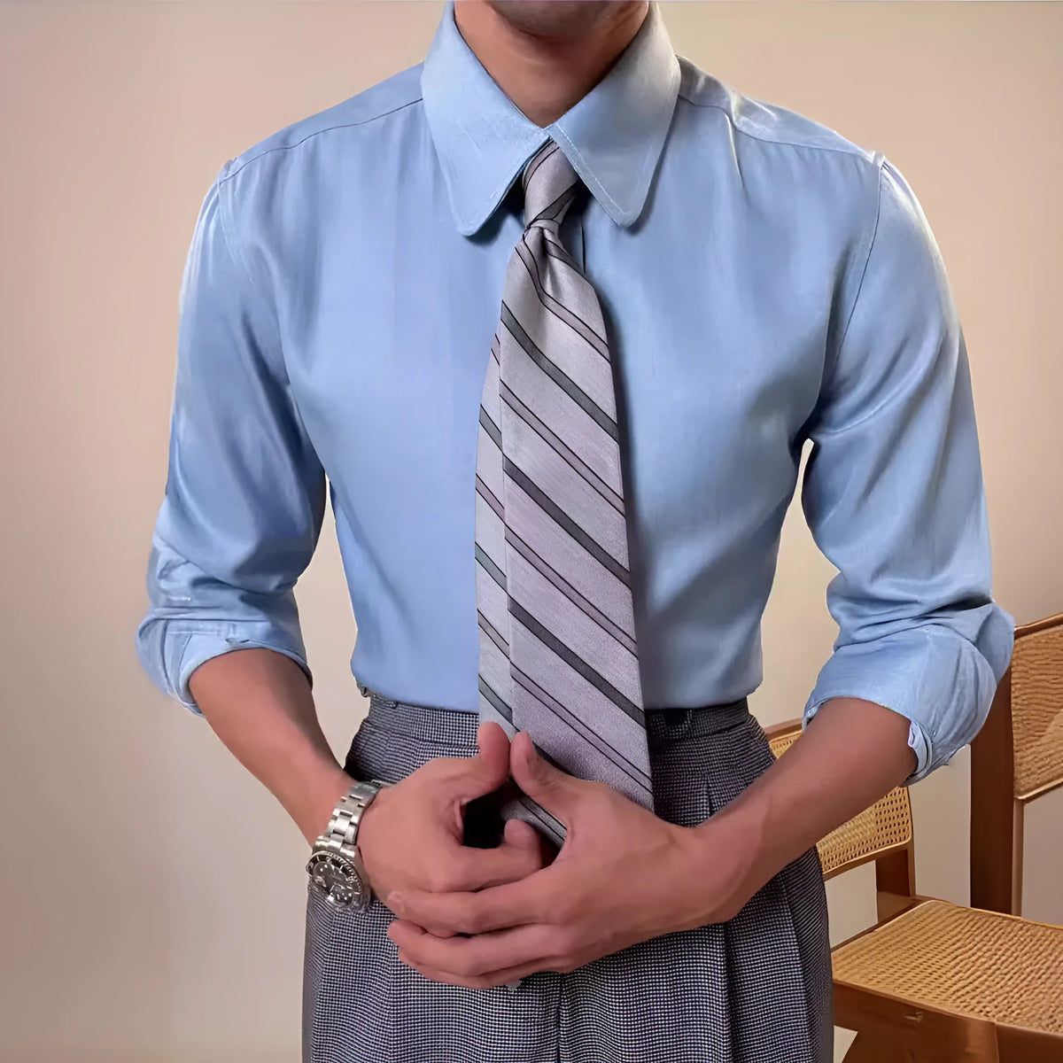 Men's blue slim fit long sleeve shirt with round collar shown in business casual styling