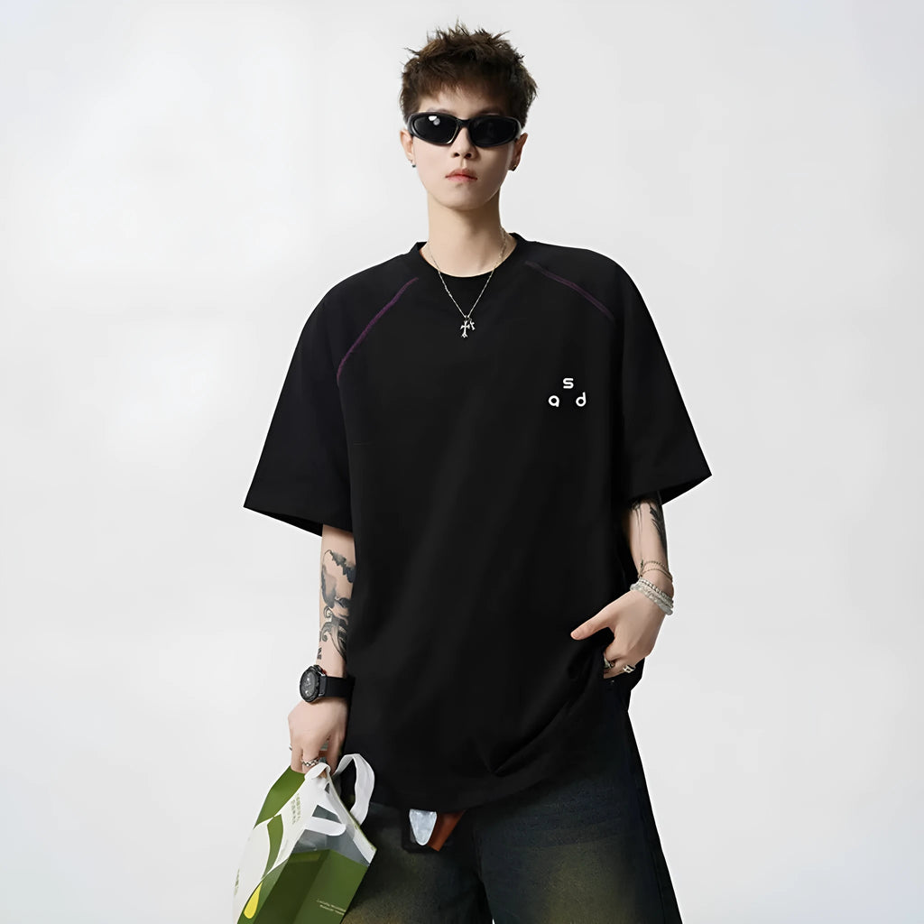Men's black cotton t-shirt with white letter print, short sleeves, and a round neck.