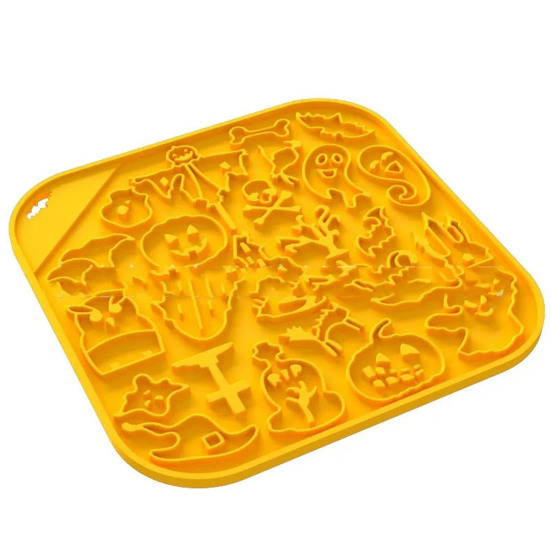 Edible silicon anti-choke slow feeding dog bowl in Halloween orange colour on floor