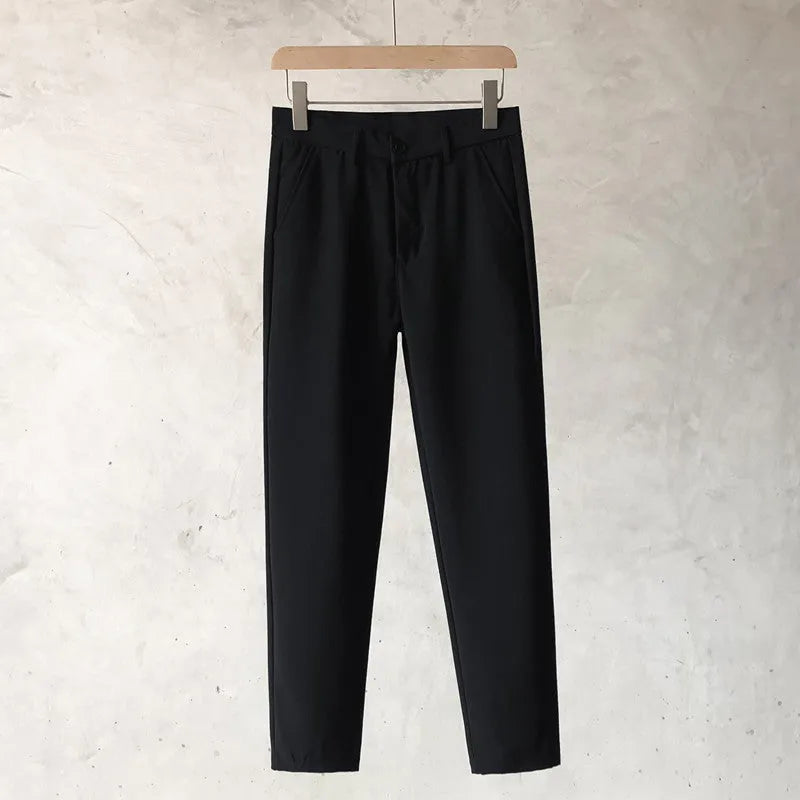 Boys slim straight wool trousers in a tapered cut with a straight leg opening.