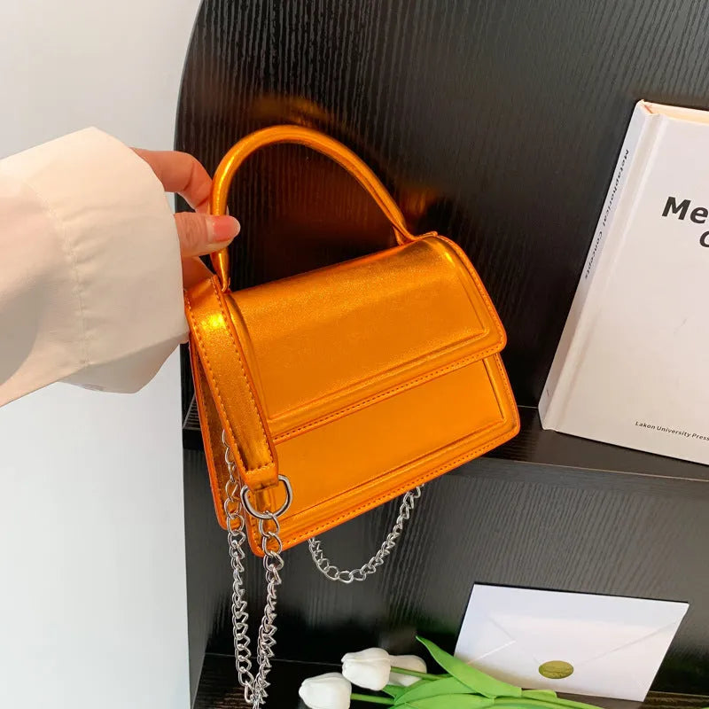Retro PU leather crossbody shoulder bag with horizontal square shape and sewing line detailing