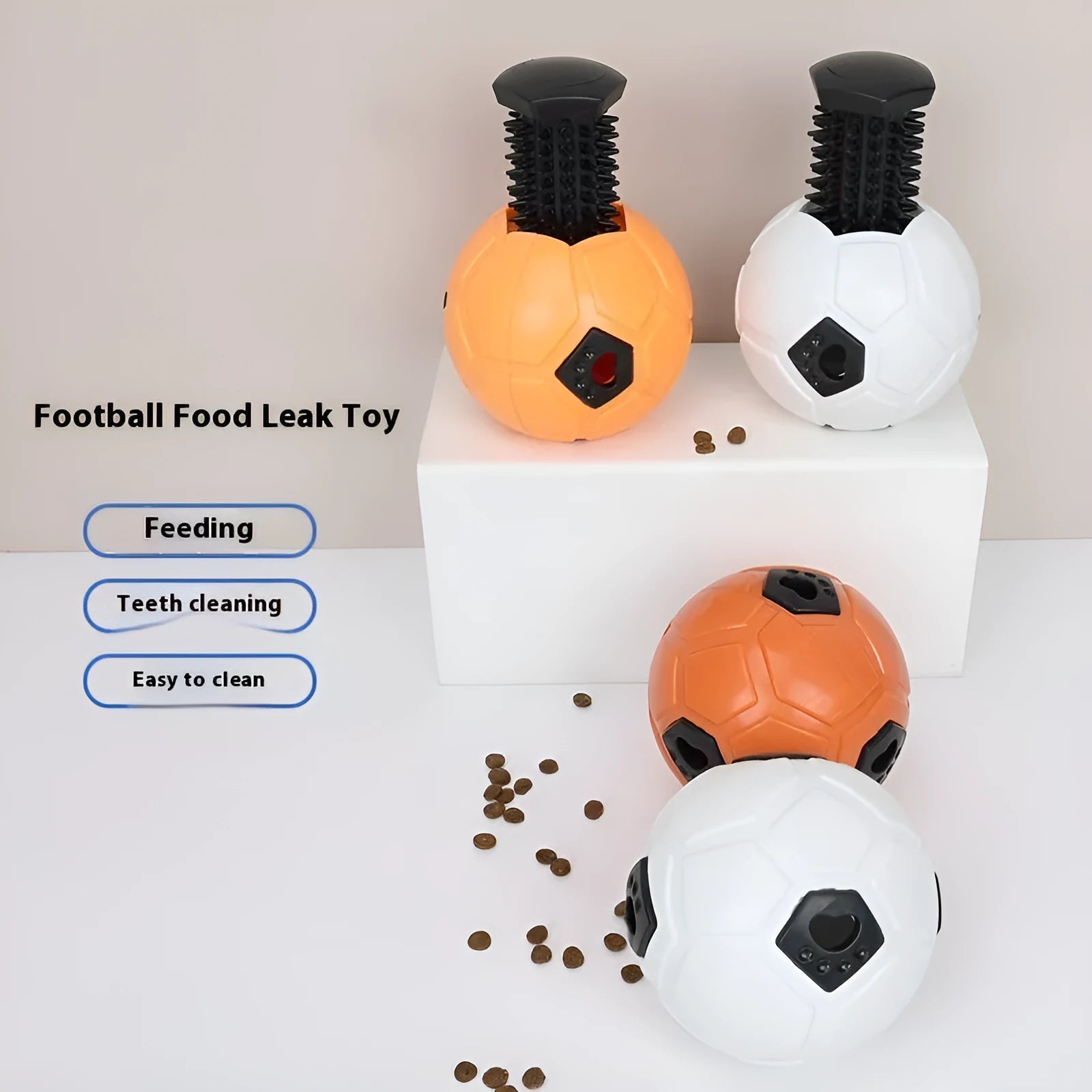 Orange and white TPR dog toy balls showing hollow style and tooth cleaning stick designs