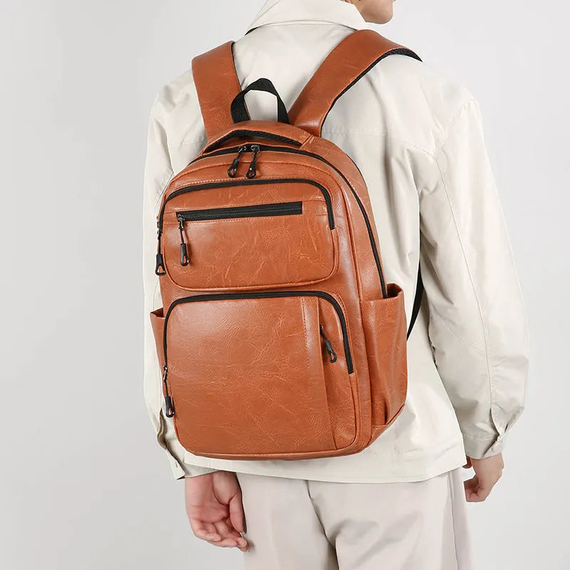 Large capacity men's black business commute backpack in composite cowhide PU with 20-35L capacity and curved shoulder straps