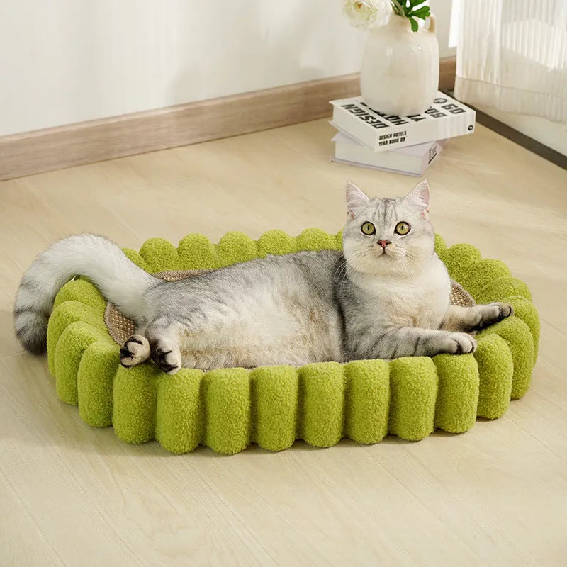 Green oval sisal cat scratcher pad bed measuring 650mm by 420mm