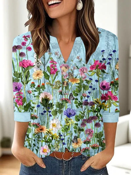 Women's loose fit V-neck top with a 3D pattern print in a casual pullover style.