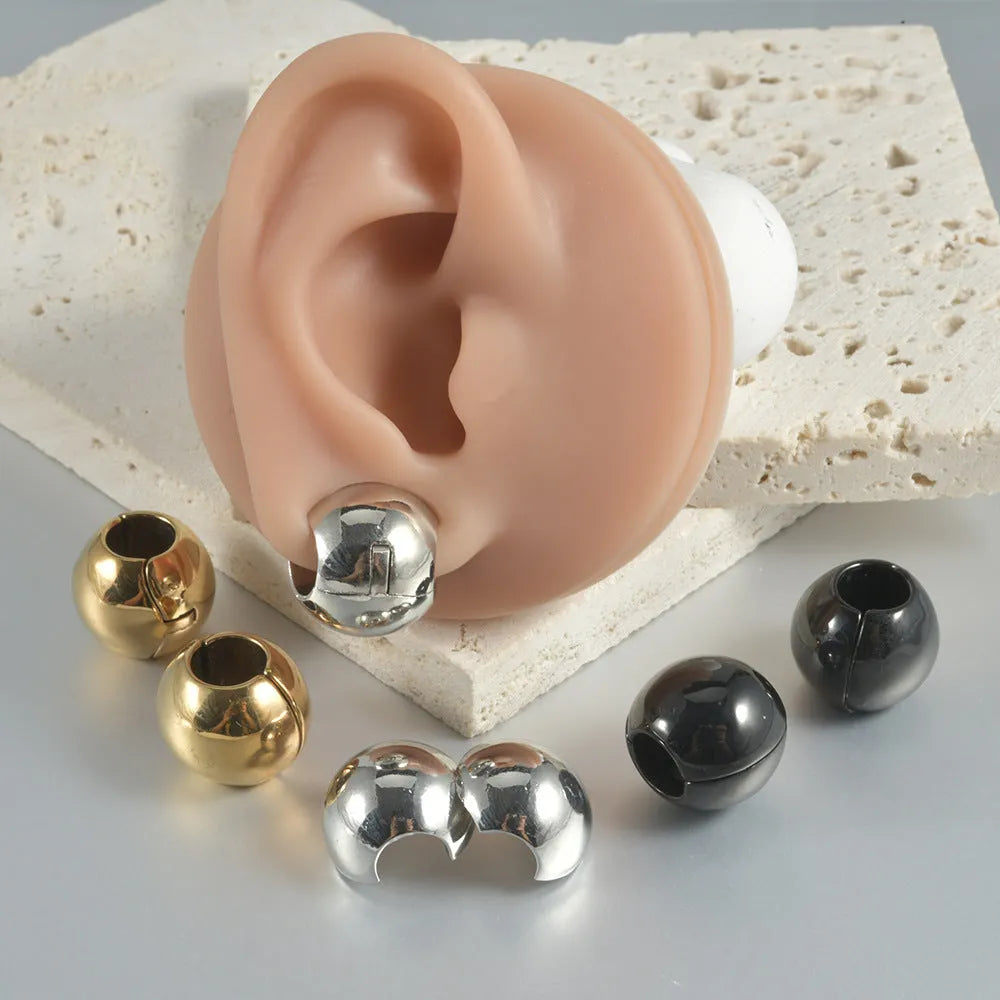 Stainless steel hollow skull Buddha earrings with geometric design in four colour options