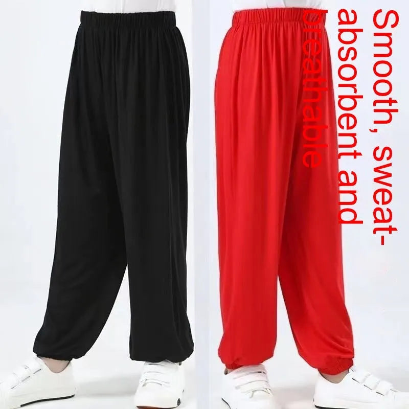 Children's high elasticity martial arts practice trousers in black, shown in a front view.