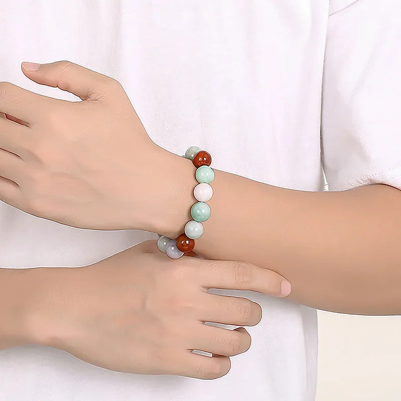 Women's natural Myanmar jade bracelet with three colours in 13mm round beads.