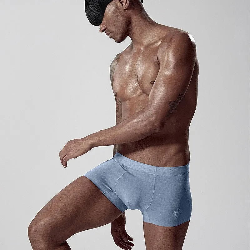 Seamless modal men's underwear in green, pink or white with mid waist design