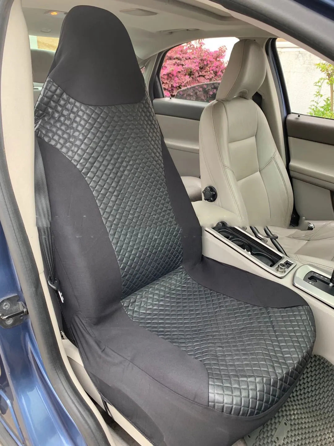 Black quilted automotive seat cover for universal car seats with plastic installation hooks