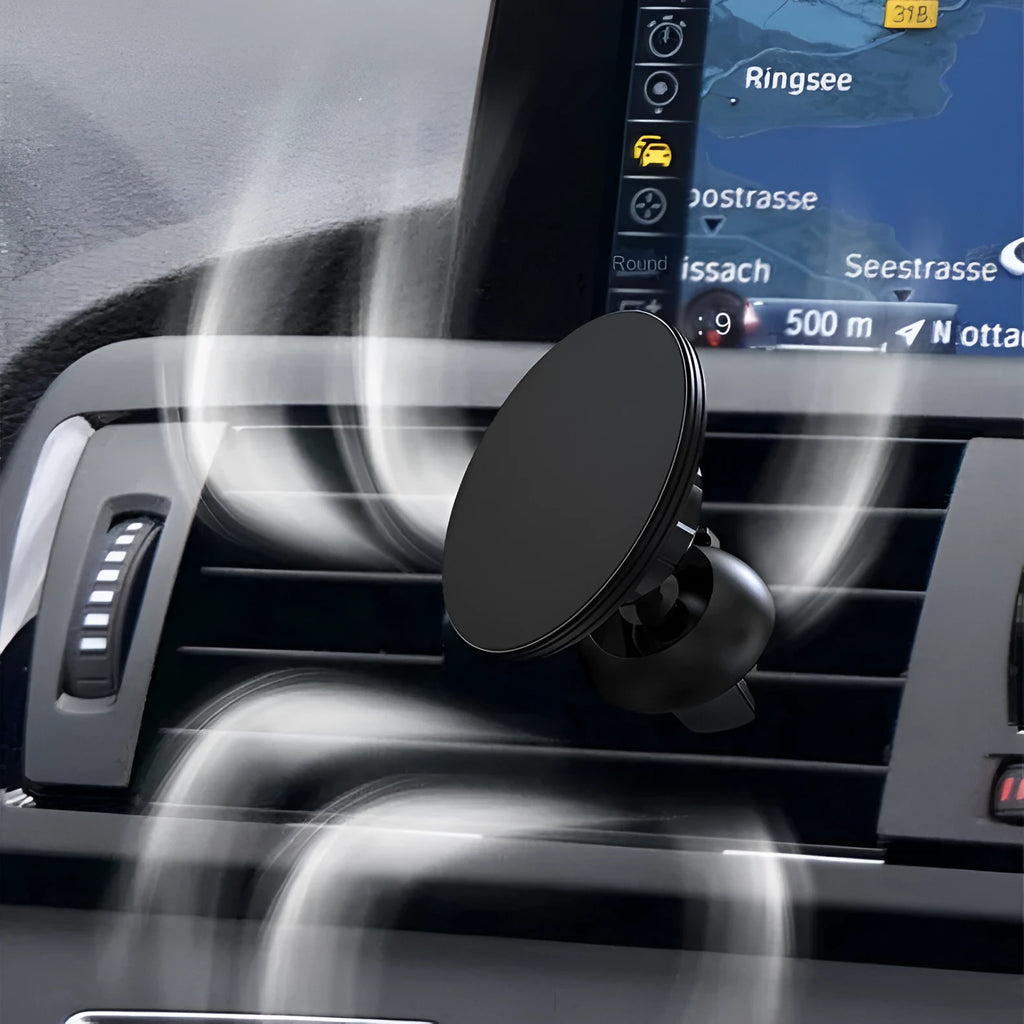 Black aluminium alloy magnetic car air vent phone holder mounted on a vehicle dashboard
