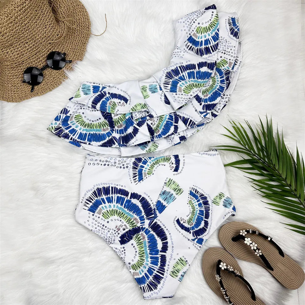 White women's one-shoulder swimsuit with double-layer lotus leaf design and high-leg split