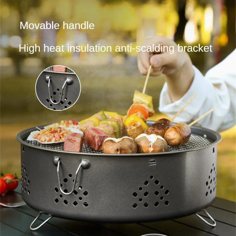 Portable stainless steel charcoal barbecue grill with removable legs and storage bag for outdoor use.