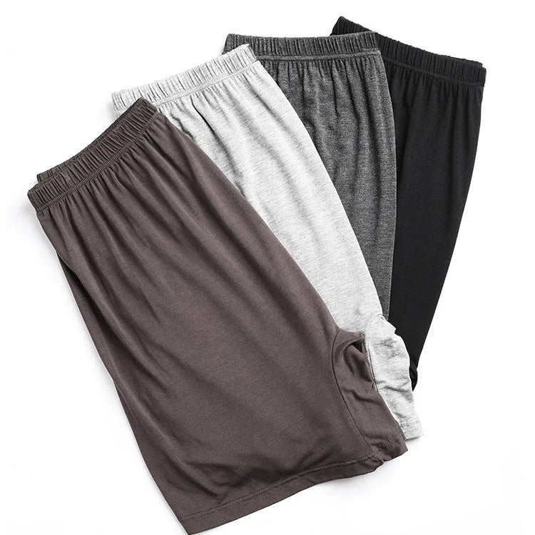 Solid colour men's modal boxer shorts with high waistband, shown in dark grey.