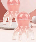 Pink octopus-shaped facial massage comb made from natural resin with storage bag