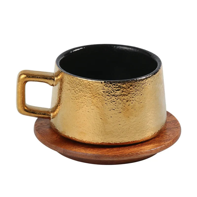 250ml solid colour tumbler cup inside a gold plated gift box with a matching gift bag.