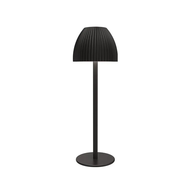Modern dimming desk lamp in black or white with a thin round base and USB cable.